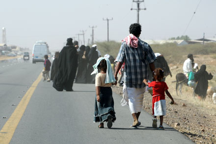 Refugiados yemeníes cruzan la frontera con la provincia saudí de Jizan. AFP/Getty Images