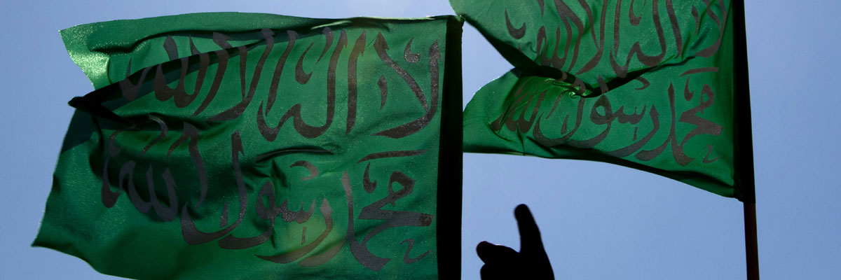 Banderas islámicas verdes que dicen: "No hay más dios que Dios, Mohamed es el mensajero de Dios". Jack Guez/AFP/GettyImages