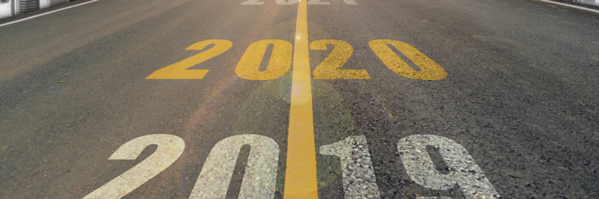 The number 2020 symbol represents the new year on the road headi